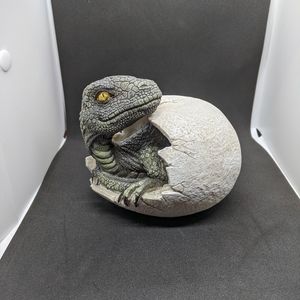 Dinosaur hatching from egg